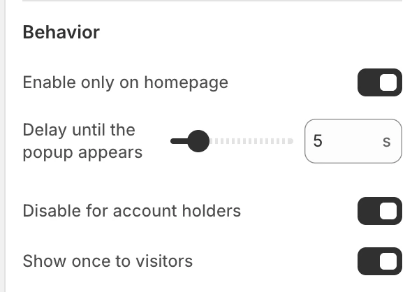 Message popup Behavior settings in the Theme Editor: Enable only on homepage, Delay until the popup appears, Disable for account holders, Show once to visitors.