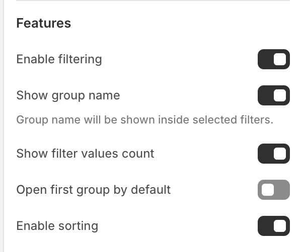 Search Features settings in the Theme Editor: Enable filtering, Show group name, Show filter values count, Open first group by default, Enable sorting.
